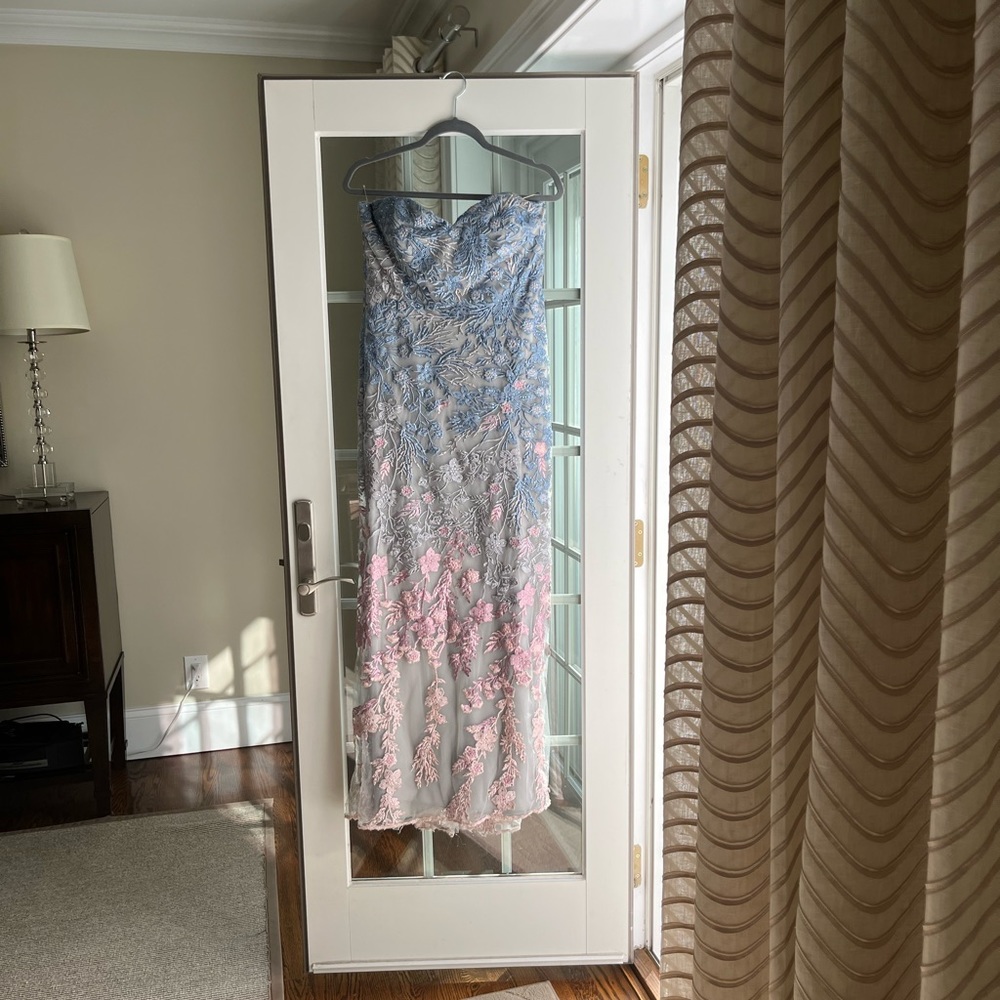 Dress is altered measure 17 armpit to armpit and 53 inches long